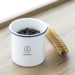 Enamelled container with a wooden lid. Capacity 760 ml.