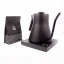 Black electric kettle on a black base with a white background, side view