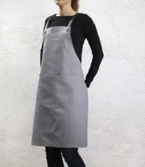 Gray barista apron with pockets, side view