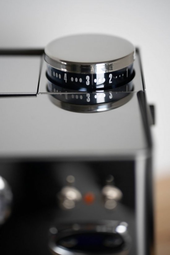 The hopper of the grinder in the Lelit Anita coffee machine.
