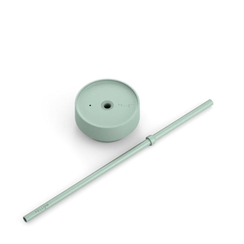 Mug isothermique avec paille pour boissons froides de couleur menthe.