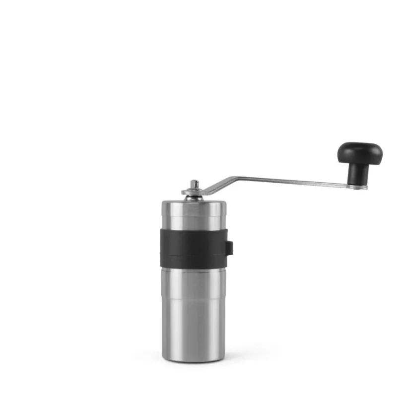 Silver manual coffee grinder on a white background