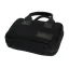 Black travel suitcase designed for carrying manual grinders.