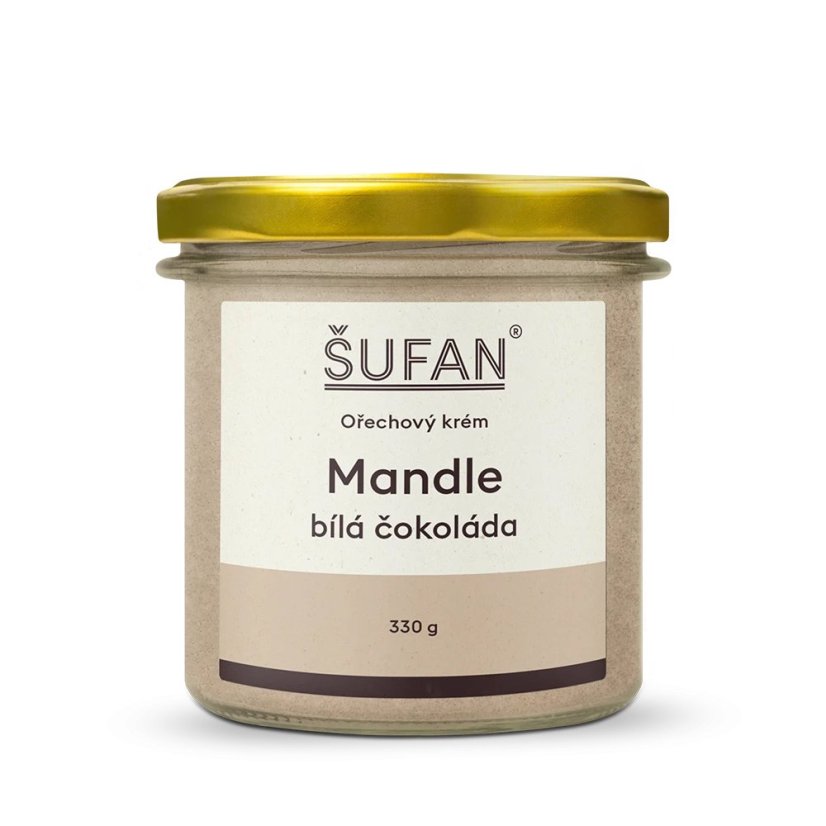 Beurre d'amande au chocolat blanc dans un pot en verre avec un couvercle doré