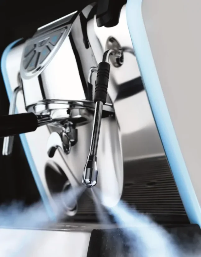Steam wand of the Musica espresso machine in operation.