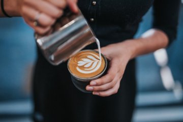 Is drinking coffee with milk harmful or is adding milk to coffee healthy?