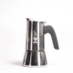 Silver Moka pot for 4 cups, Bialetti New Venus with a black handle.