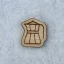 Wooden badge of the Order of the Golden Kettle with an engraved kettle symbol Wooden badge of the Order of the Golden Kettle with an engraved kettle symbol