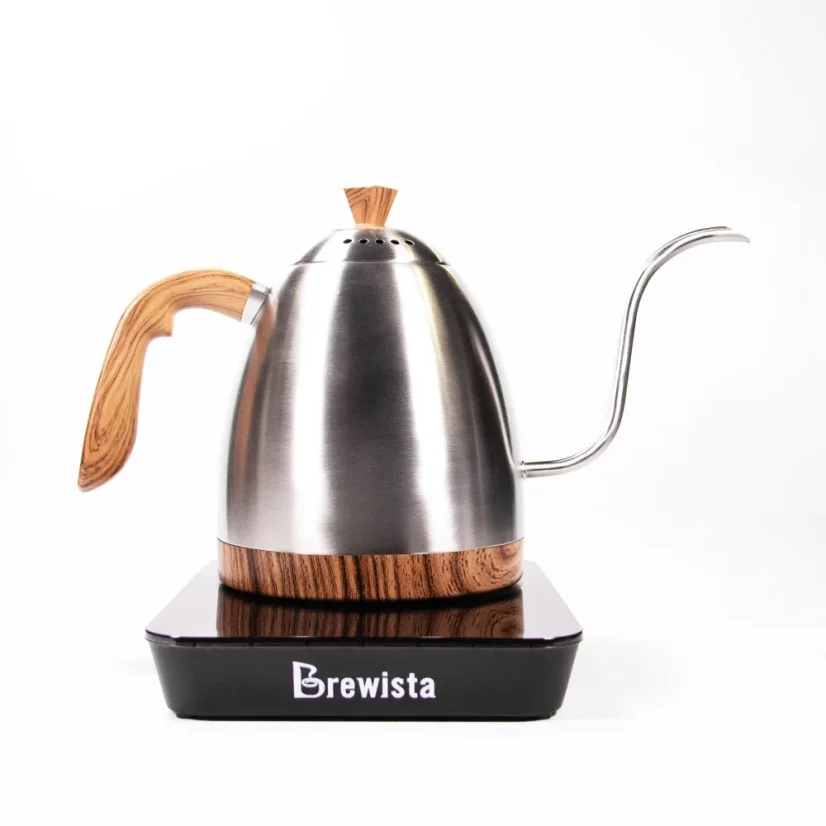 Silver electric kettle with a wooden handle on a black base with a goose neck on a white background, side view.