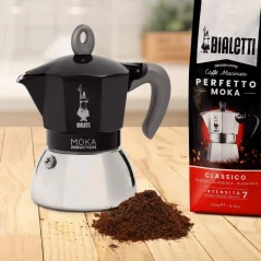 Stainless steel Bialetti Moka Induction coffee maker in black with a 6-cup capacity.
