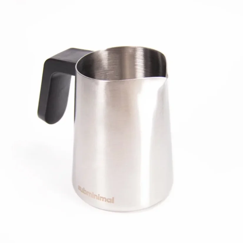 Silver Subminimal Flowtip milk pitcher with black handle on a white background