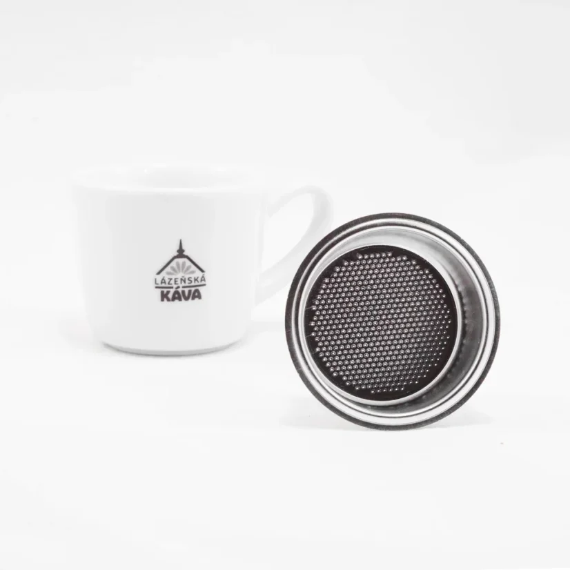 Silver IMS basket on a white background with a cup, view from below