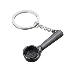 El llavero negro en forma de palanca es un regalo ideal para los amantes del café. Un accesorio estiloso que alegrará a cualquier entusiasta del café.