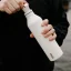 White MiiR Narrow Mouth Bottle thermos mug with a capacity of 680 ml, ideal for travel.