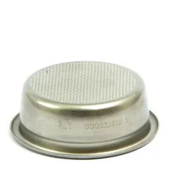 Reversed stainless steel basket for portafilter with a perforated surface