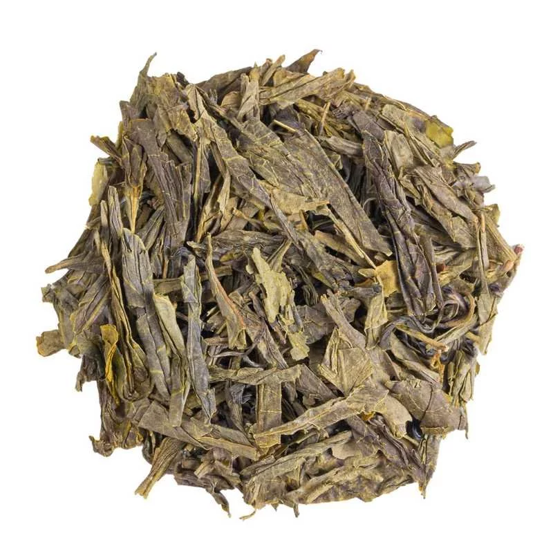 Loose green tea China Sencha Special BIO on a white background, top view