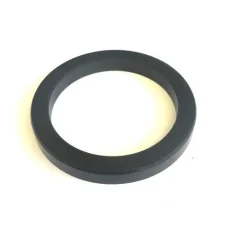 Black rubber coffee machine head seal on a white background