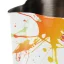 Close-up view of the spout of a white milk pitcher with colorful spots, from the Barista Space Splash brand.