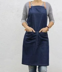 Denim blue barista apron with pockets, front view