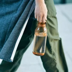 Amber plastic water bottle with a capacity of 500 ml.