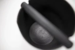 Plastic black knock box, detail inside the bucket