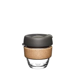 Glass thermal mug with a capacity of 227 ml, featuring a grey lid and a cork holder against a white background.