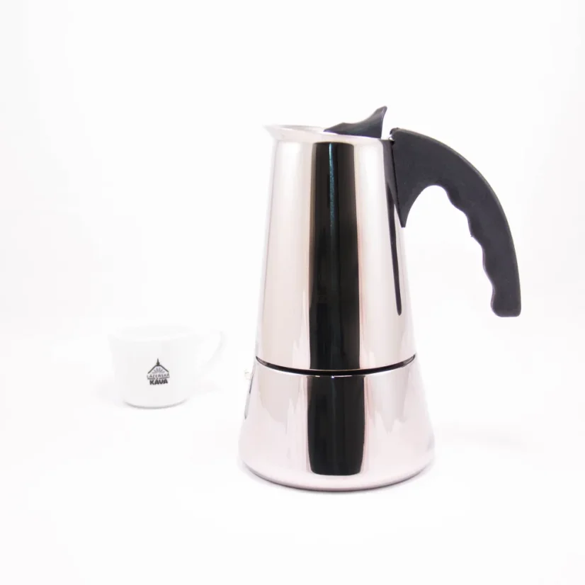 Silver moka pot with a black handle for 10 cups on a white background with a cup of coffee.