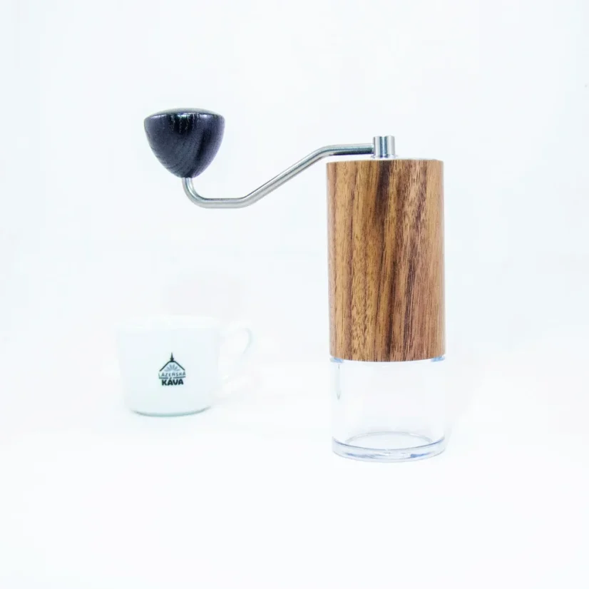 Manual coffee grinder Comandante C40 MK4 Nitro Virginia Walnut with a small label.