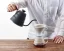 Pouring coffee with an even and steady flow Pouring coffee with an even and steady flow