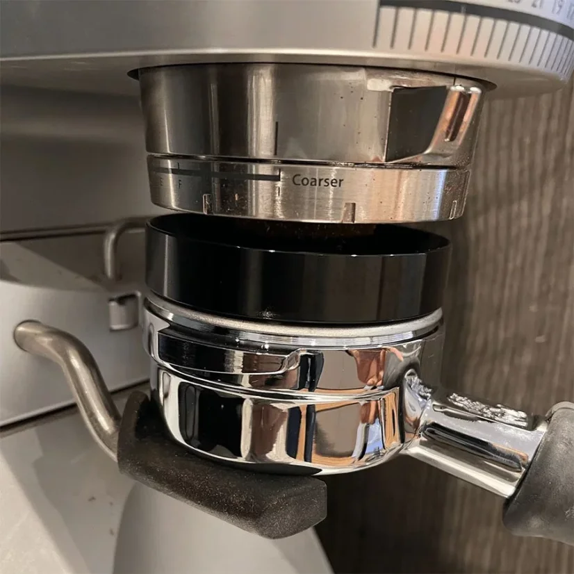 Black coffee dosing funnel 58 mm, designed for easy coffee dosing.