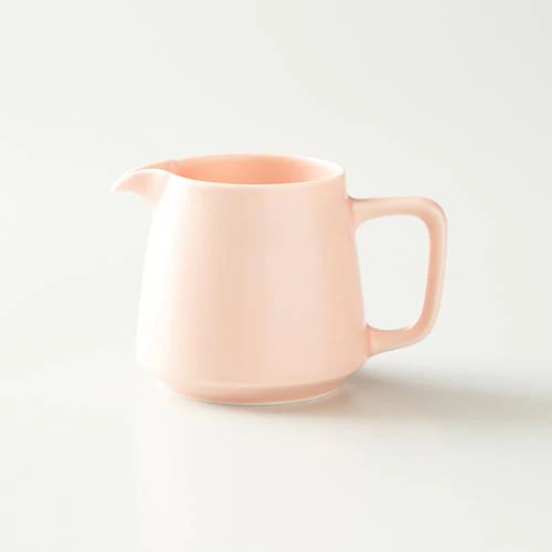 Porcelain mug for filter coffee in pink colour from Origami brand.