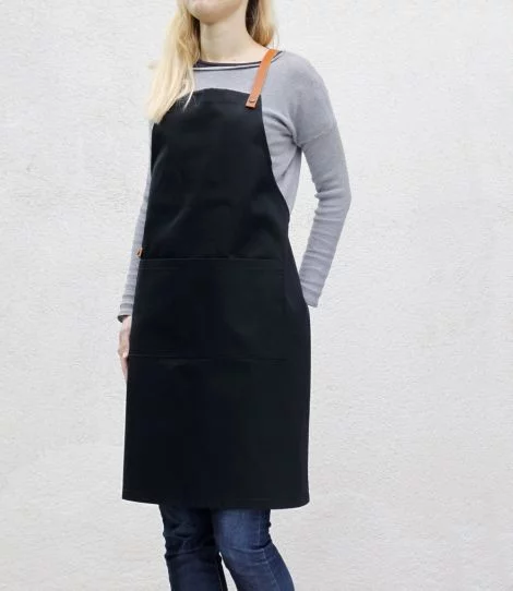 Black barista apron with pockets, side view