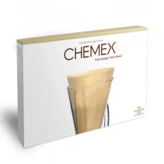 Nebaltīti papīra filtri Chemex iekārtai oriģinālajā iepakojumā uz baltas fona.