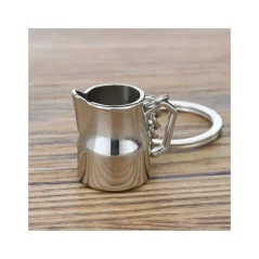Porte-clé en forme de petite cafetière argentée est un cadeau idéal pour les amateurs de café. Porte-clé en forme de petite cafetière argentée est un cadeau idéal pour les amateurs de café.