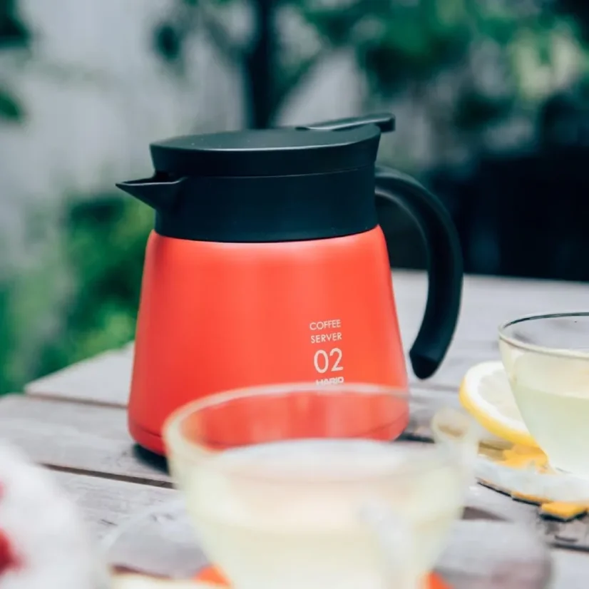 Porte-théière isolante rouge en acier inoxydable de 600 ml, idéale pour garder le café chaud.