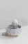 Aoomi Mess cup with a capacity of 330 ml, placed in a bowl of the same color.