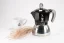 Aluminum moka pot suitable for induction with the logo of the Italian manufacturer Bialetti, composed with a cup with a meadow flowers design.