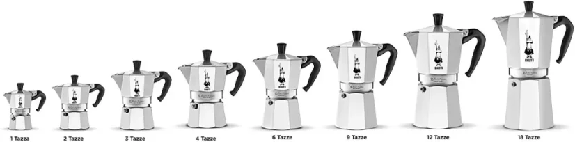 Silver Bialetti Moka Express pots in a row from the smallest to the largest on a white background
