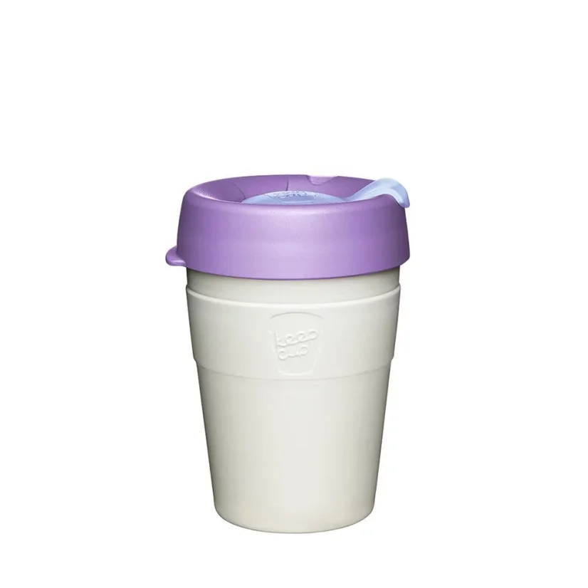 Gobelet thermique en acier inoxydable blanc avec un couvercle violet.