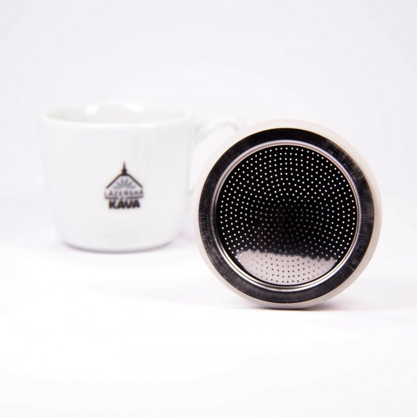 Espresso cup with the Spa Coffee logo next to the replacement seal for the Bialetti mocha pot.