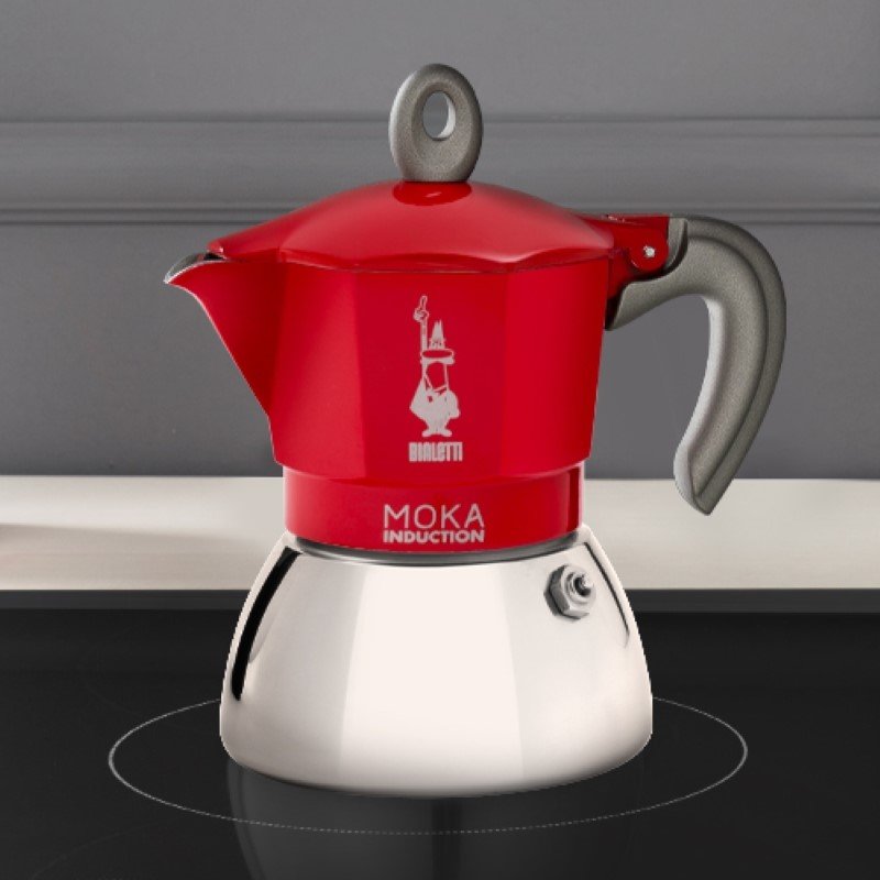 Bialetti Moka Induction red teapot, placed on the induction plate.