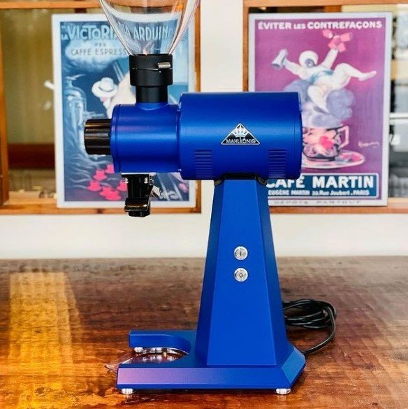 Mahlkönig EK43S blue professional coffee grinder. Source.