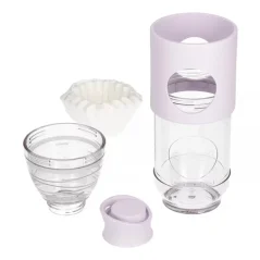 Cafflano Go-Brew drip coffee maker in lilac color with a 500 ml capacity, perfect for brewing fresh coffee while traveling.