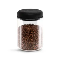 Transparent coffee and tea canister with a capacity of 1200 ml and a black lid by Fellow Atmos.