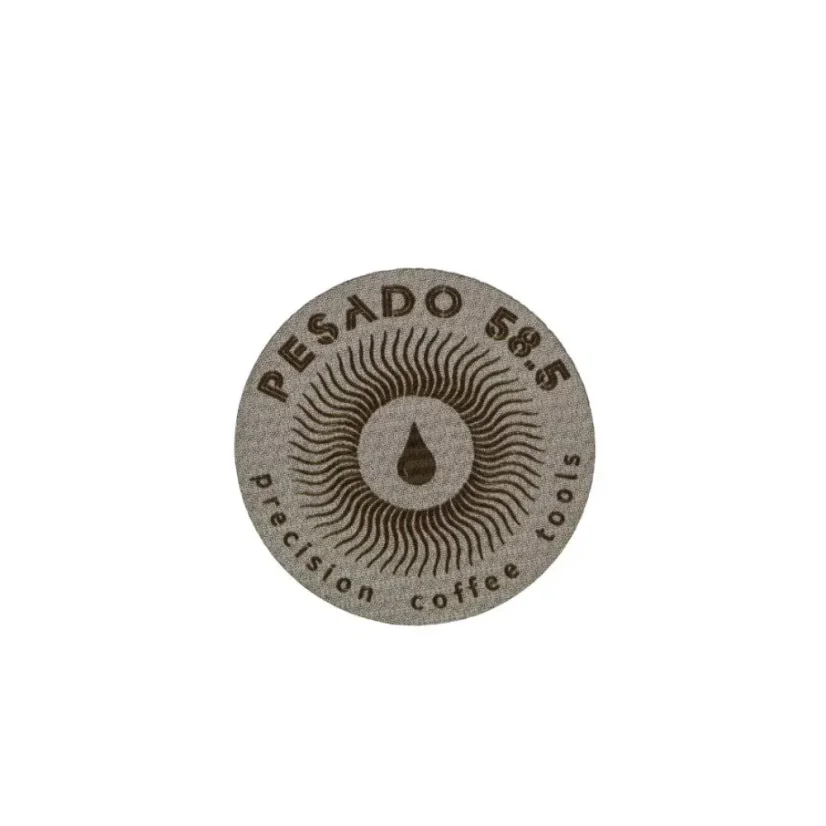 Écran de café en acier inoxydable Pesado avec un diamètre de 58,5 mm pour une distribution parfaite du café dans votre panier à expresso.