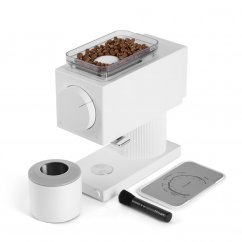 Fellow Ode coffee grinder in white finish with ground coffee container