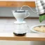 White Hario W60-02 drip coffee maker made from durable PCT resin, ideal for brewing filter coffee. White Hario W60-02 drip coffee maker made from durable PCT resin, ideal for brewing filter coffee.