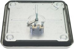 Ënneschten Deel vun der Kachplack mat Metallplack, véier Montagelächer an engem ugeschraubte Thermostat an der Mëtt.