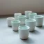 The 150 ml celadon green porcelain mug from Loveramics Dale Harris is the perfect accessory for coffee lovers, with its elegant design complementing modern dining beautifully.