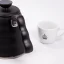 Black gooseneck kettle Hario Buono with a capacity of 1200 ml, ideal for precise pouring. Black gooseneck kettle Hario Buono with a capacity of 1200 ml, ideal for precise pouring.